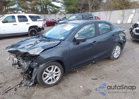 2017 Toyota Yaris Ia из США, поврежденный, VIN 3MYDLBYV3HY173485